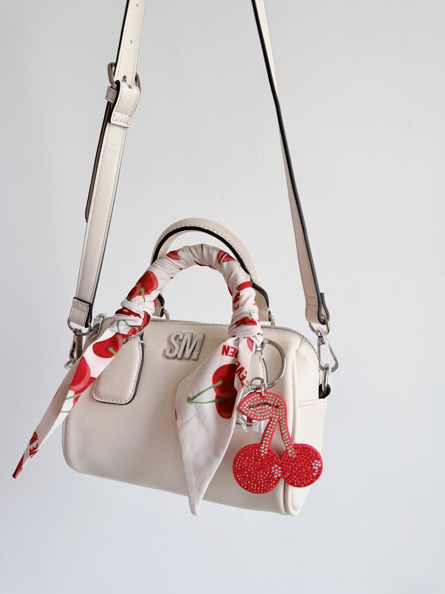 rowan cherry crossbody bag