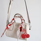rowan cherry crossbody bag