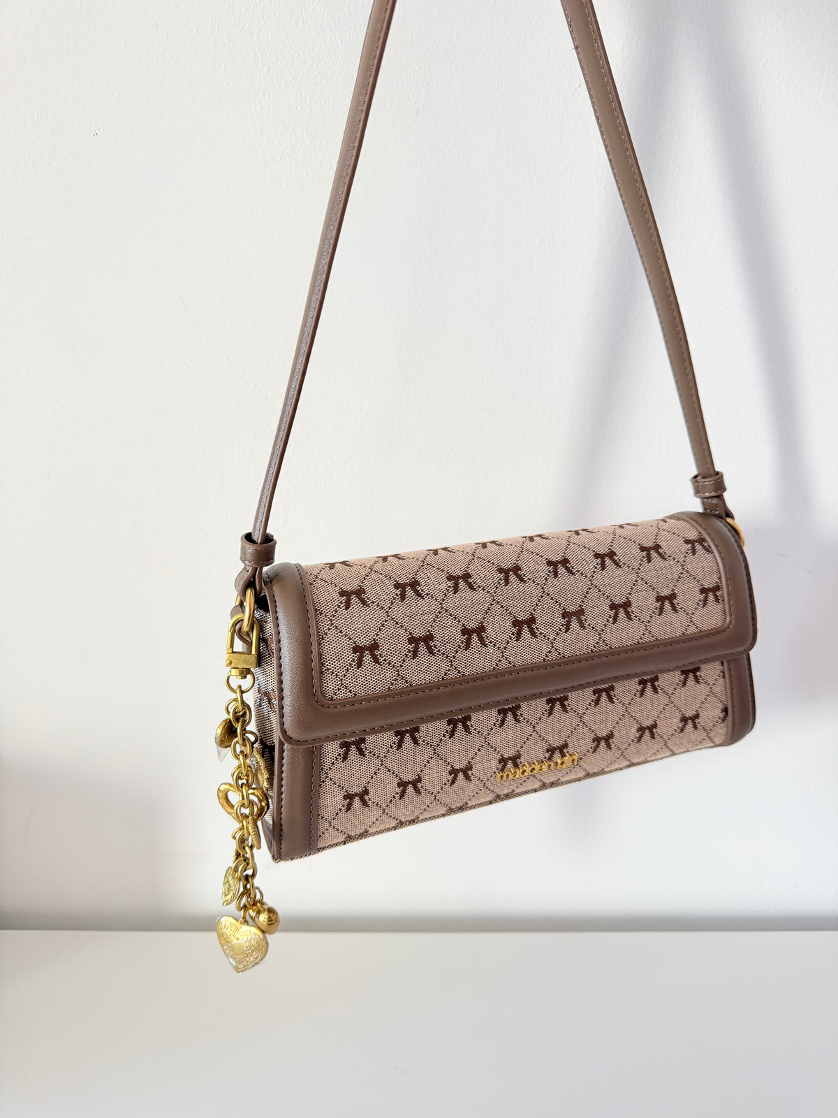 flap shoulder bag bows