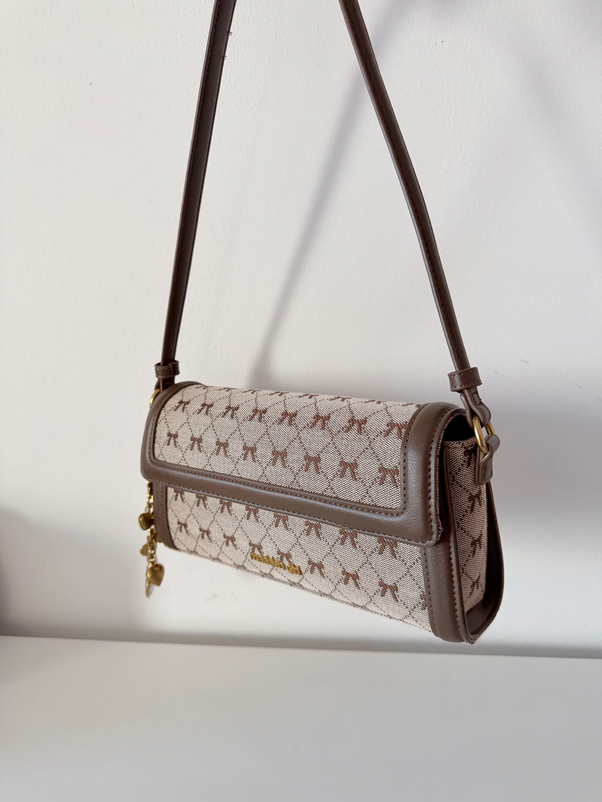 flap shoulder bag bows
