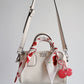 rowan cherry crossbody bag