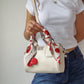 rowan cherry crossbody bag
