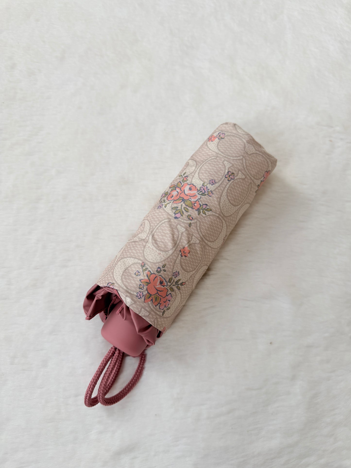 paraguas flor coach