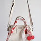 rowan cherry crossbody bag