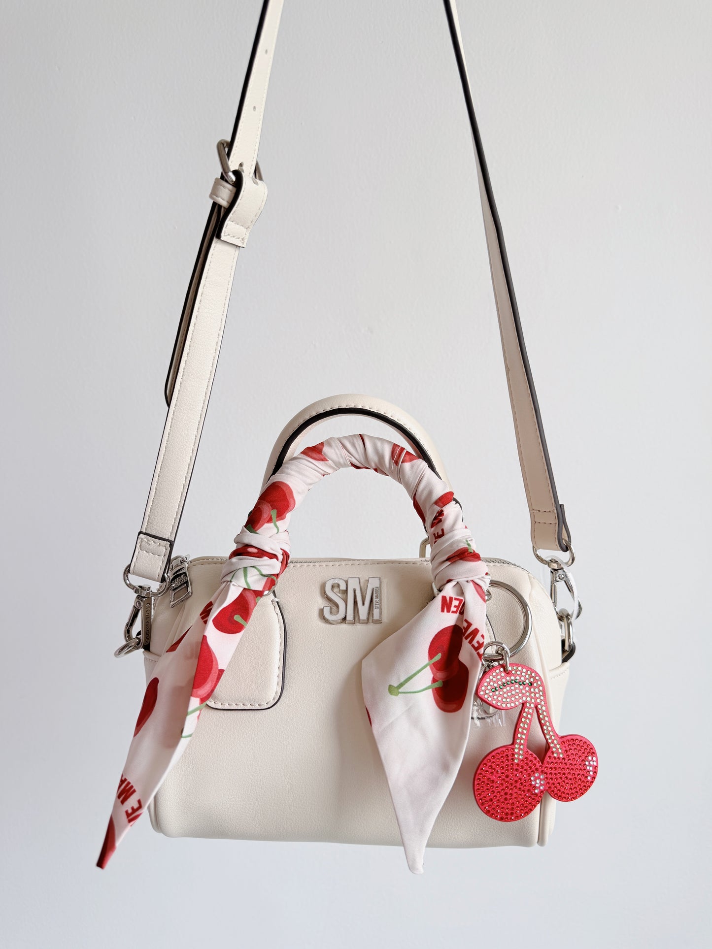 rowan cherry crossbody bag