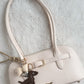 ashton shoulder bag + charms