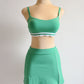 set deportivo top + falda / short