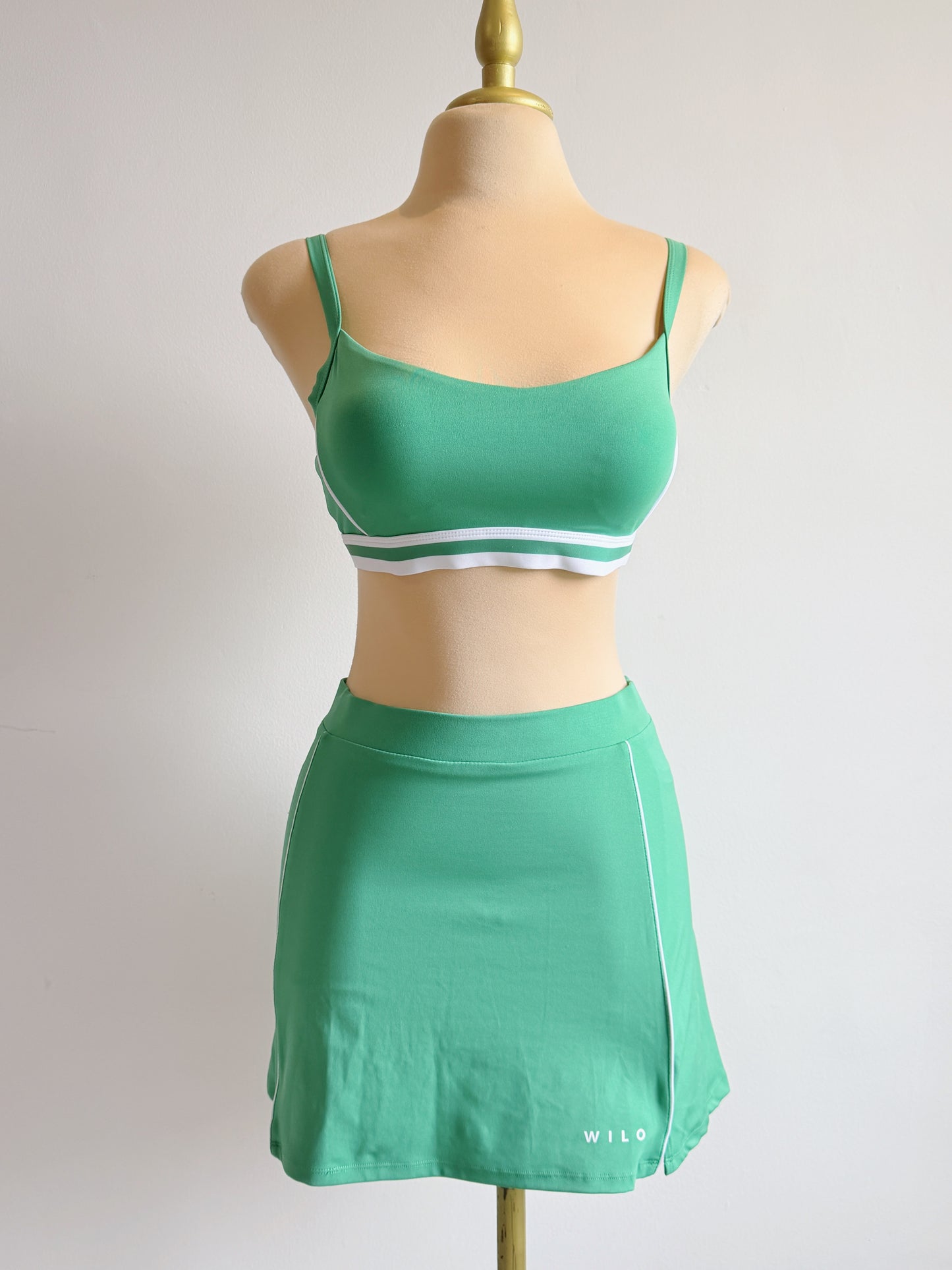 set deportivo top + falda / short