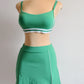 set deportivo top + falda / short