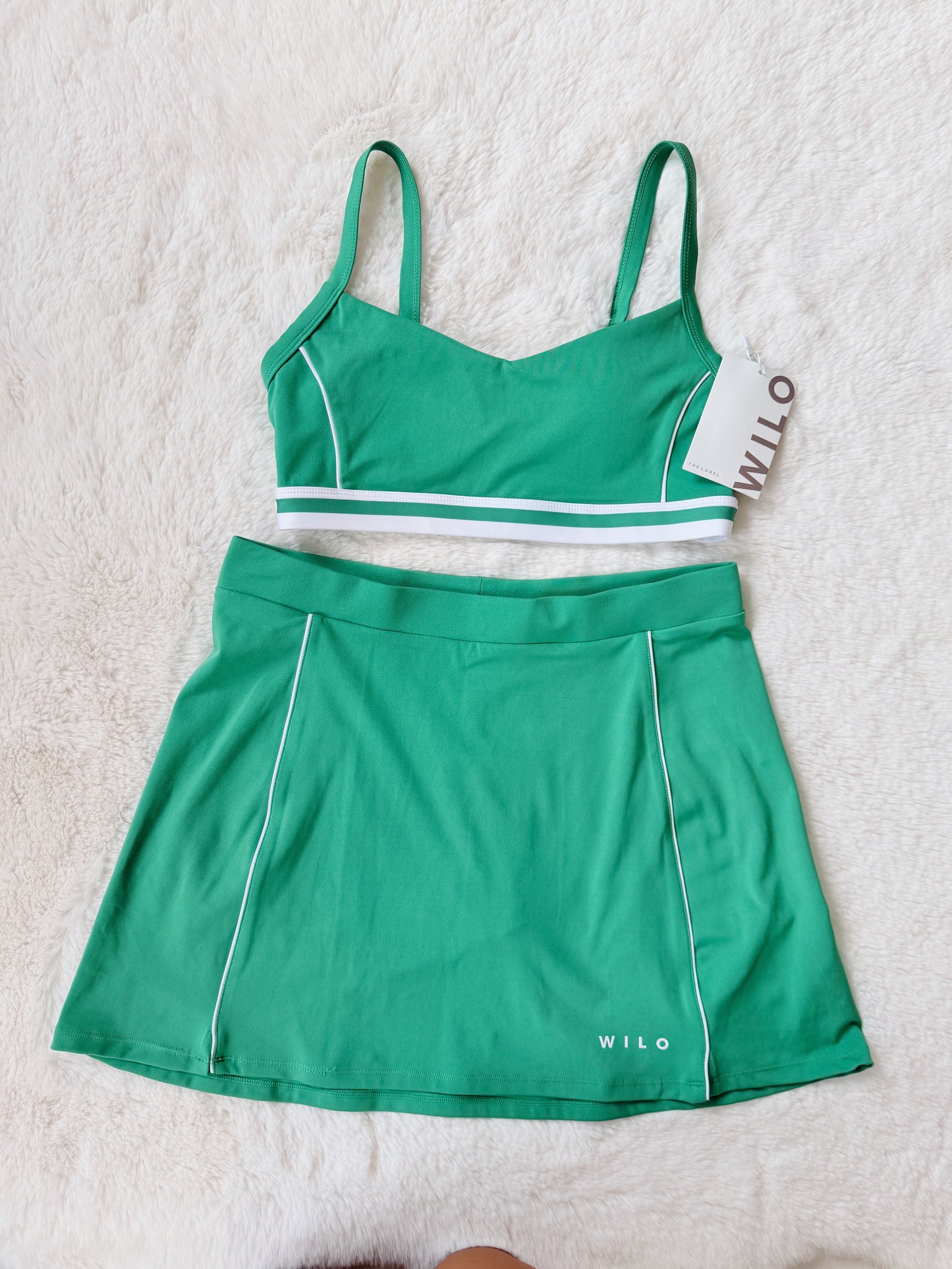 set deportivo top + falda / short