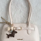ashton shoulder bag + charms
